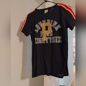 PINK black and red and white stripe tee shirt. Size medium